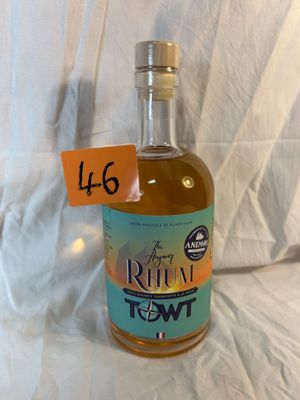 a bottle of rum that is sitting on a table