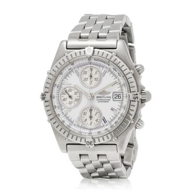the watch is silver and has a white dial on the face