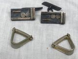 two pairs of brass triangle cufflinks and a pair of triangle cufflinks