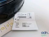 two tickets on a table next to a luggage bag