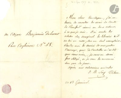 un vieux document sur lequel figure une lettre manuscrite au recto
