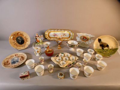 many different types of porcelain dishes and bowls on the table