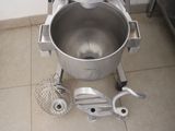 an image of a mixer in a kitchen with a whisk attachment