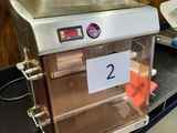 a machine that is sitting on top of a counter