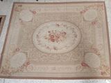 a rug on the floor with a flower design on it