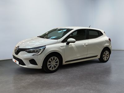 a white car is parked in a room with a white wall