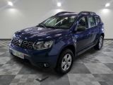 a picture of a blue dacia parked on a checkered floor