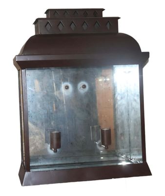 a glass display case with a cup inside of it