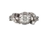 une image d'une bague en diamant sur fond blanc