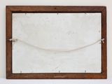 a picture of a mirror hanging on a wall