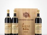 three bottles of wine in front of a wooden box