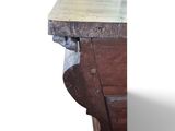 a close up of a wooden bench with a wooden top