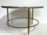 an image of a table with a marble top and brass legs