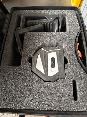 a black case with a pair of headphones in it