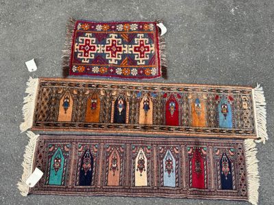 two rugs on the ground with different colors and patterns