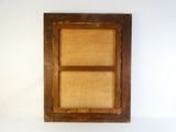 a picture of an old window with a wooden frame on it