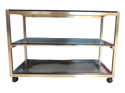 stainless steel and glass shelf with three shelves on casteors