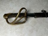 a picture of a sword that is laying on the floor