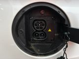 a close up of an electric car charging station