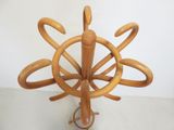 an image of a wooden umbrella stand on a white surface