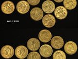 some gold coins are arranged in the shape of a triangle