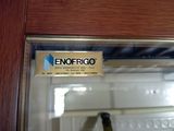 a sign that says enoffrigo on the door of a train