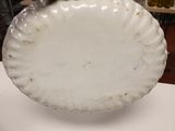 a white plate that is sitting on a table