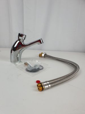 a faucet with a hose attached to it on a table