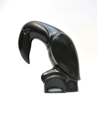 a black sculpture of a bird on a white background