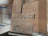 a close up of a piece of wood on a table