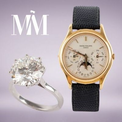 une image représentant une montre en or et une bague en diamant sur laquelle figurent les lettres « wwi »