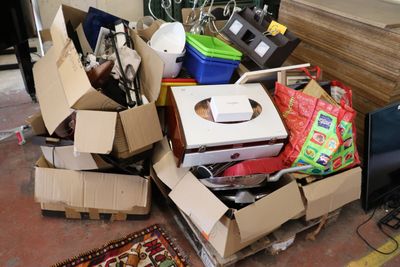 a pile of boxes that are sitting on the floor