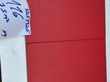 a picture of a red and white picture on the wall