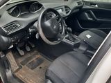 the interior of a car with the door open showing the dashboard