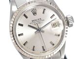 an image of a silver rolex watch on a black stand