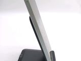 a cell phone that is sitting on top of a stand