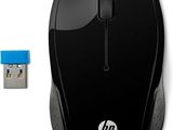 une souris noire avec un bouton bleu à côté