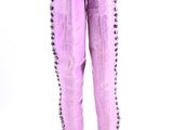 purple leather boots with studs on the toes and heel