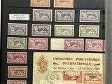 many different stamps on display in a display case