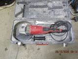 a tool that is sitting in a case on the floor