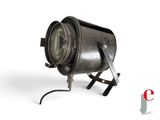 an image of a black spotlight light on a white background