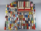 a lot of toy cars that are on the table