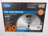 the box of a circular saw blade is sitting on the table