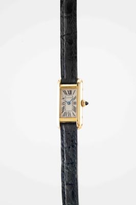 a close up of a wrist watch with a black strap