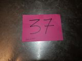 a pink sticker with the number 37 on it