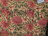 a close up of a chair cushion with a tag on it