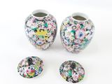 three vases that are sitting next to each other on a table