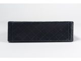 a black leather wallet with a diamond pattern on the front