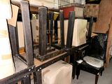 many pieces of furniture that are stacked on the shelves