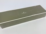a box that is sitting on a white surface